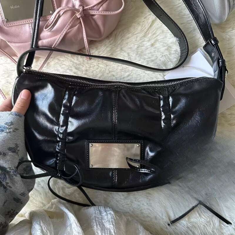 Borsa a tracolla con coulisse e fiocco in metallo di nicchia coreana_voghion.com