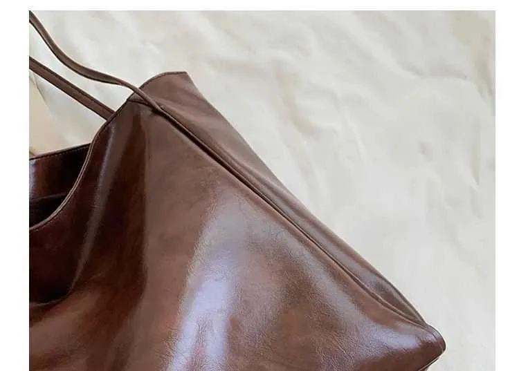 Ρετρό Κόκκινη τσάντα αγορών για αθλητικά και αναψυχή Fi μεγάλης χωρητικότητας από δέρμα Haruku Simple Handbag Y241026_voghion.com