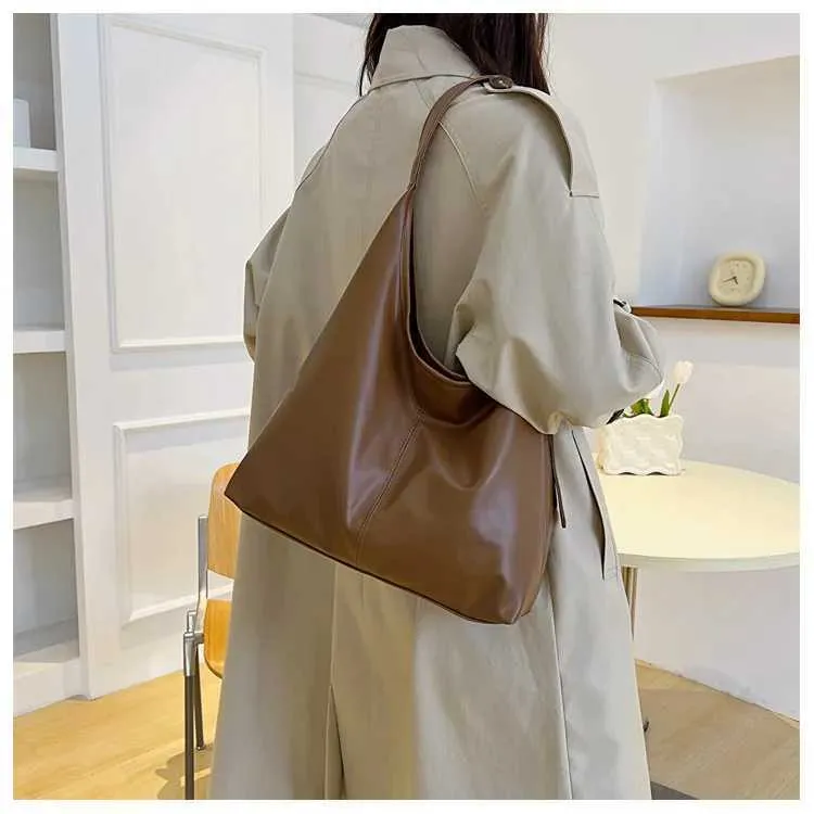 Borsa a tracolla alla moda per donna con fibbia dorata minimalista e tracolla regolabile, borsa da donna Handba241211_voghion.com