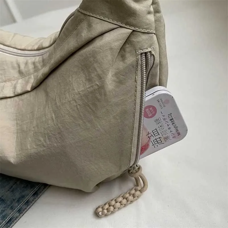 Sac à bandoulière en nylon 2024 pour femme, nouvelle collection été, grande capacité, design polyvalent et de niche, messager Ba241103_voghion.com
