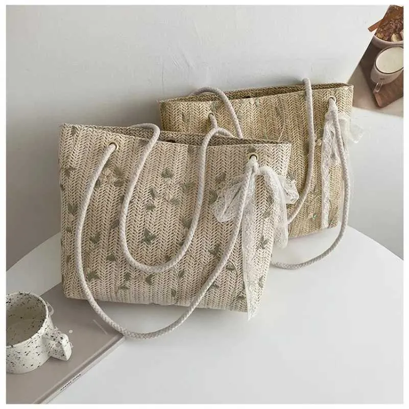 2024 New Summer Wenfei Woven Fem All Mah Portable Bucket Designer Handbag Picnic Bag Y241109_voghion.com
