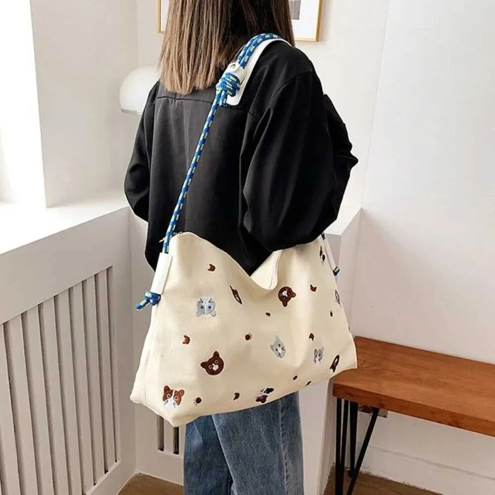 Nouveaux sacs à main de grande capacité pour les courses, sac à bandoulière simple en nylon pour les voyages portables avec dessin animé Ba241214_voghion.com
