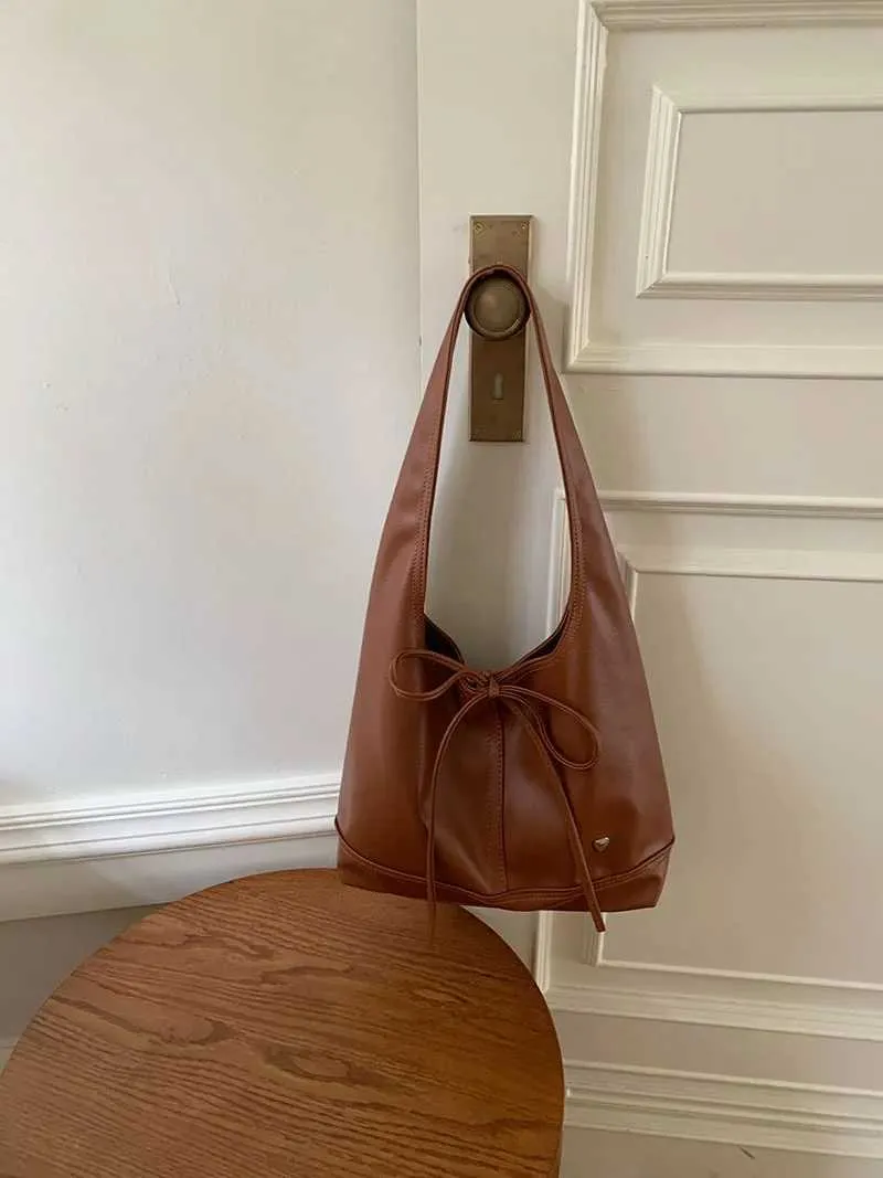 Elegante dames schoudertas en handtas met strik design_voghion.com