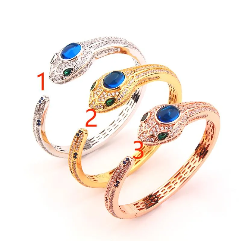 Set de pulsera rígida de serpiente y anillo en plata y oro mujer_voghion.com