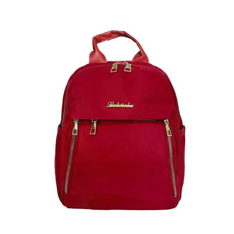 Sac à dos tendance en nylon imperméable à fermeture éclair de grande capacité avec filetage 2024 Hot Selg Sac polyvalent pour femme Mochila Mujer Y241116_voghion.com