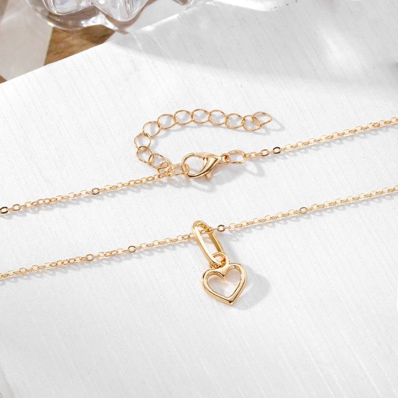 Liebesanhänger Halskette für Frauen hohler Stil hochwertiger Sinn für alle Spielpullover Schlüsselbeinkette Schmuck_voghion.com