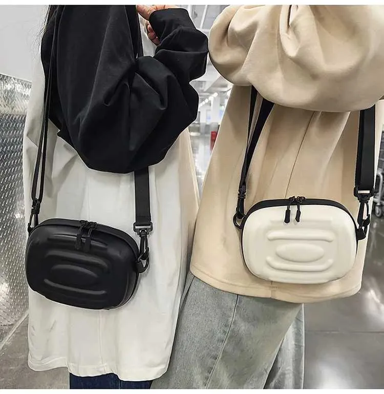 Sac à bandoulière simple polyvalent pour hommes et femmes, nouvelle marque tendance de niche, sac à bandoulière à coque rigide à la mode, petit carré_voghion.com