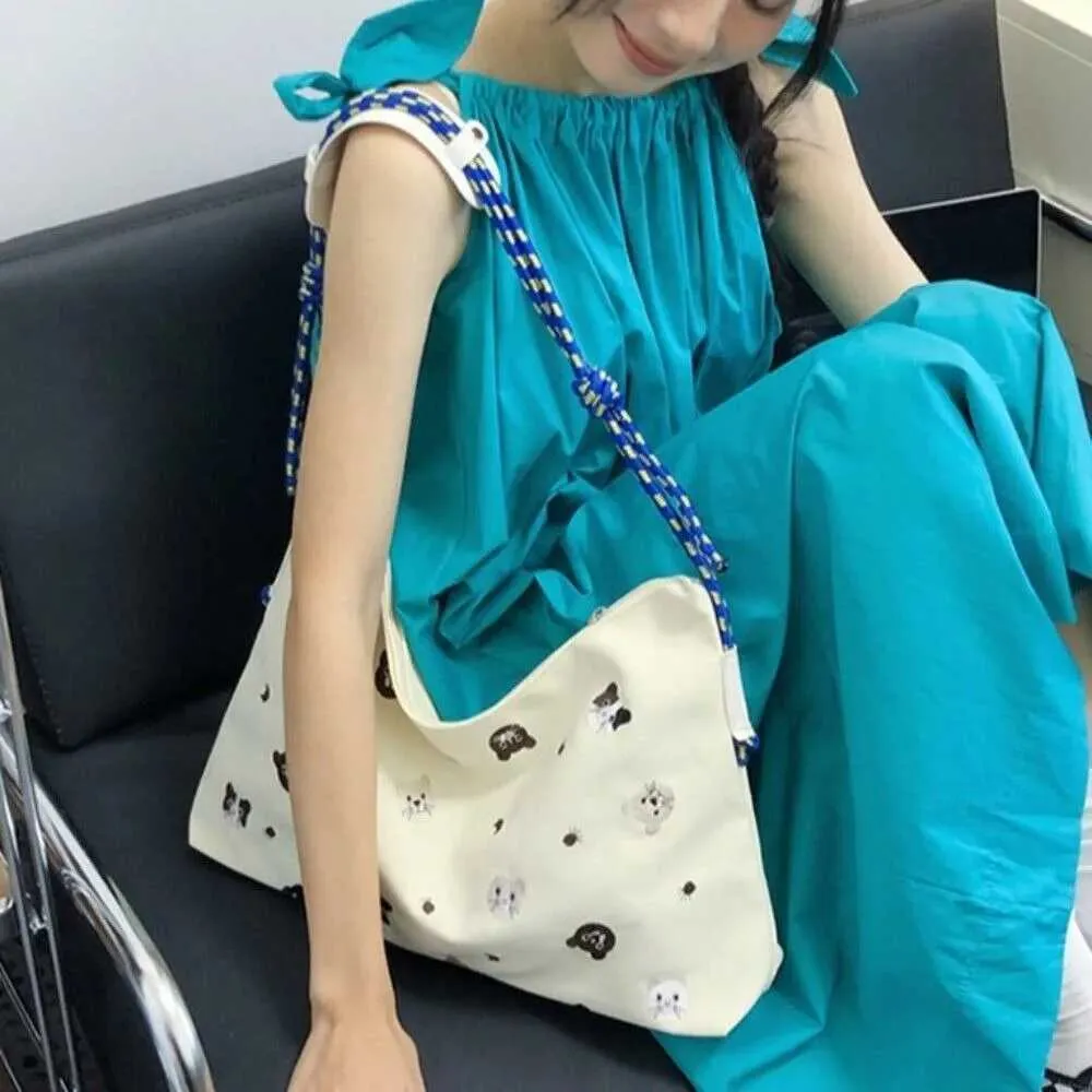 Nouveaux sacs à main de grande capacité pour les courses, sac à bandoulière simple en nylon pour les voyages portables avec dessin animé Ba241214_voghion.com