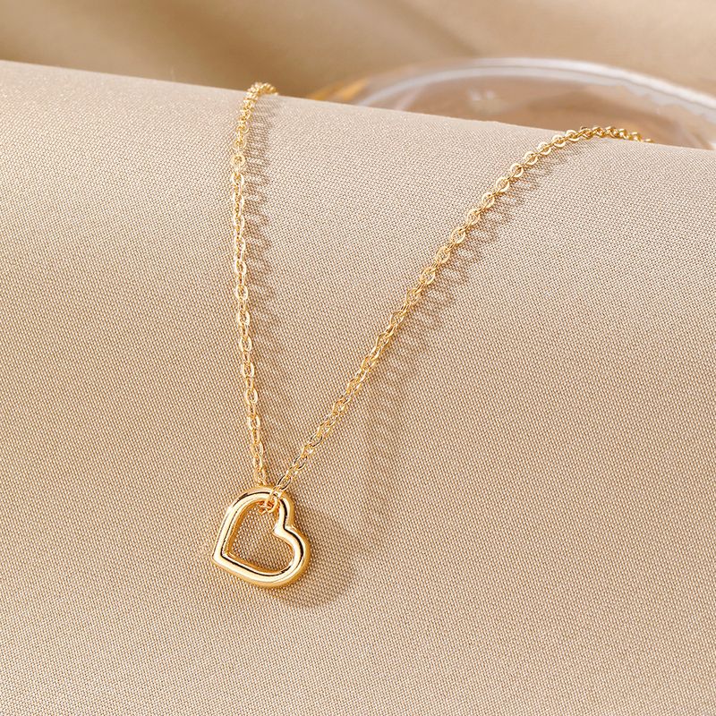Liebesanhänger Halskette für Frauen hohler Stil hochwertiger Sinn für alle Spielpullover Schlüsselbeinkette Schmuck_voghion.com
