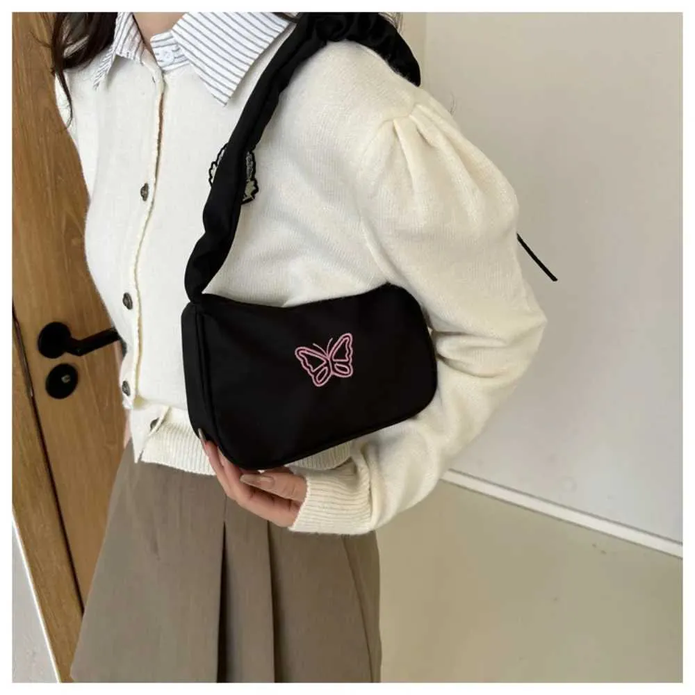 Tikand Bowknot Shoder Bag Y2k stiilis volangidega käepide Nyl Bow meigipulga kott käekott Y241026_voghion.com