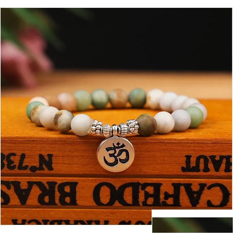 8mm Mattit Stein Strang Armband Yoga Chakra Mala Om Lotus Frauen Männer Perlen Charme Handgemachten Schmuck Drop Lieferung jew_voghion.com