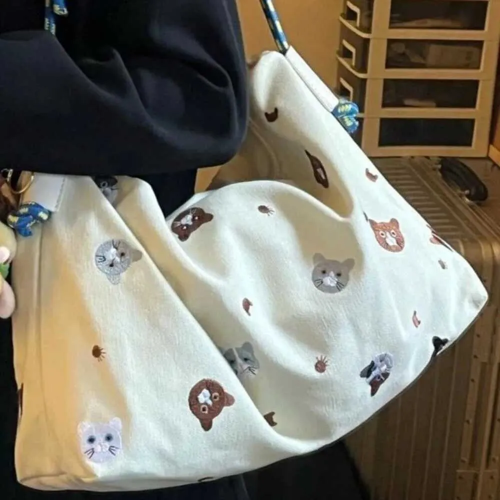 Nouveaux sacs à main de grande capacité pour les courses, sac à bandoulière simple en nylon pour les voyages portables avec dessin animé Ba241214_voghion.com