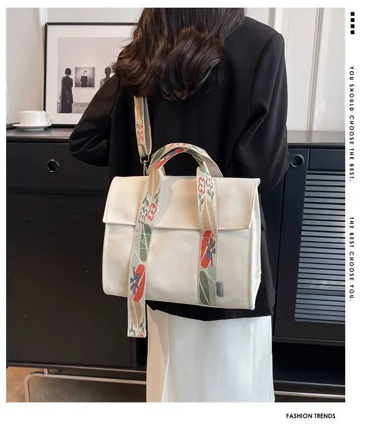 Stor axelremsväska i canvas och crossbody för damer_voghion.com