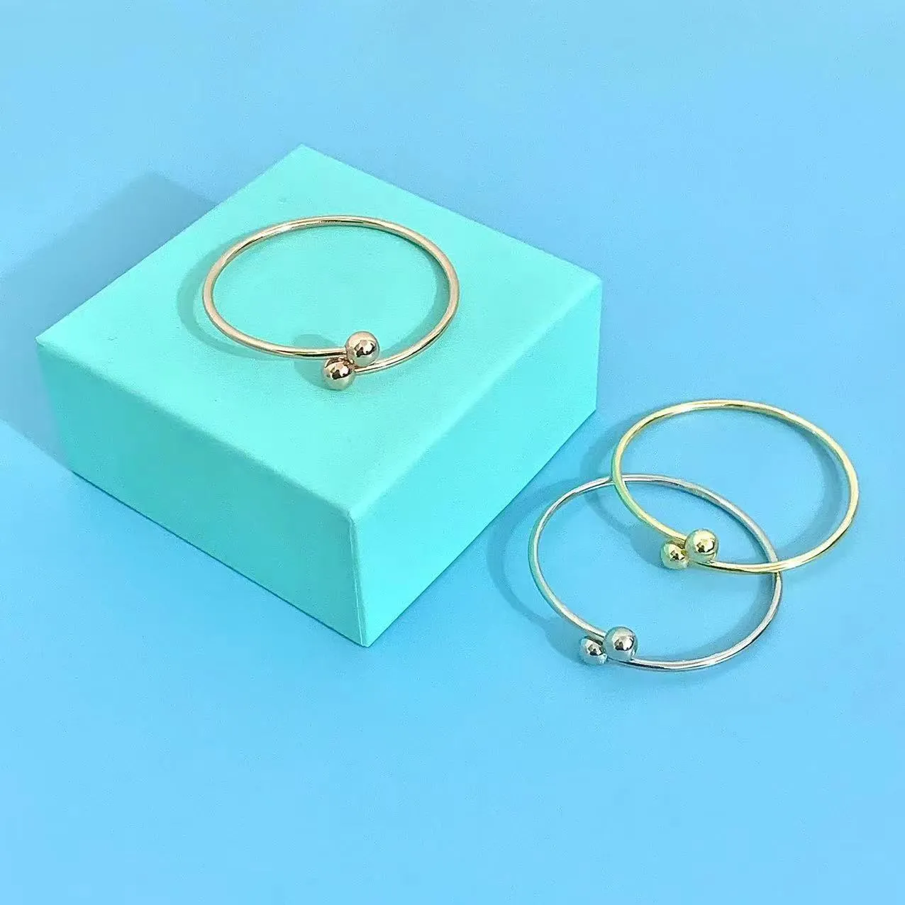 Bracciale rigido lotus elegante da donna placcato oro e argento_voghion.com