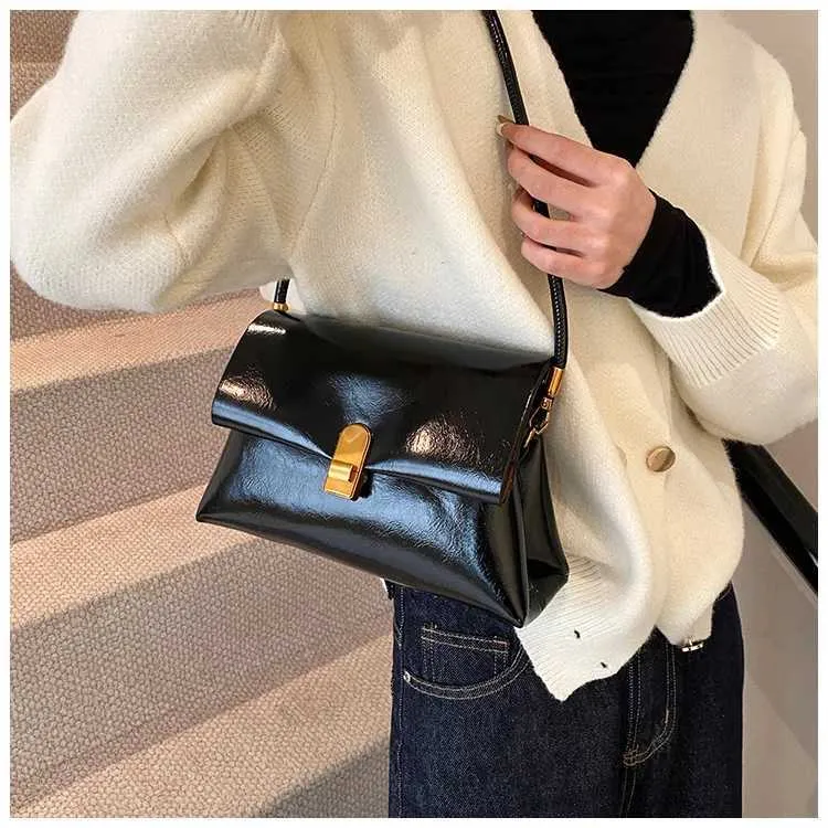 Strukturerad axelremsväska och crossbody väska för damer_voghion.com