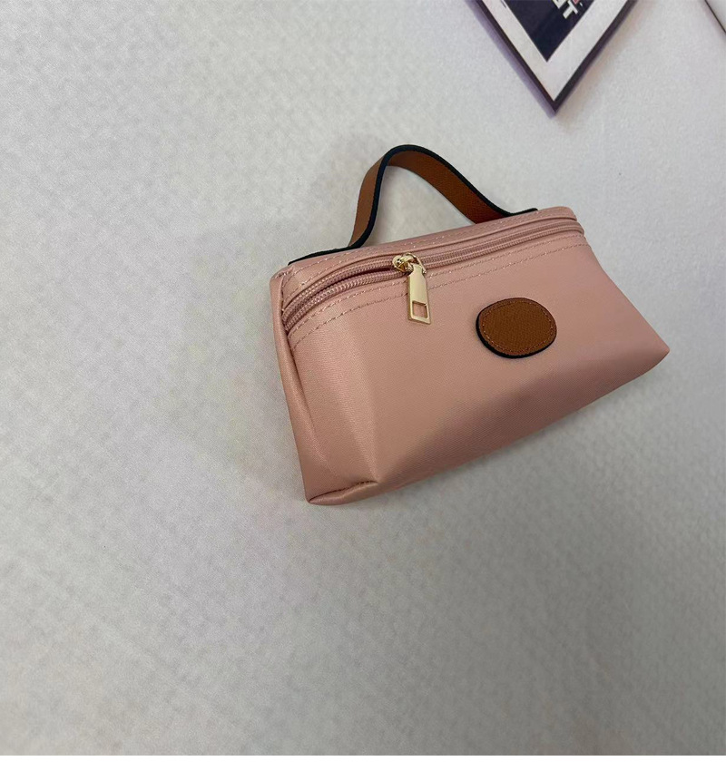 2024 nuova mini borsa per cosmetici portatile alla moda, portamonete per gnocchi alla moda, in nylon femminile, impermeabile e leggero_voghion.com