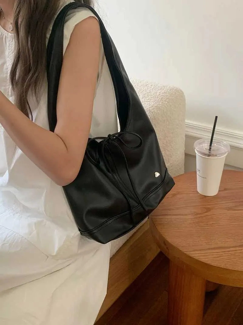 Elegante dames schoudertas en handtas met strik design_voghion.com