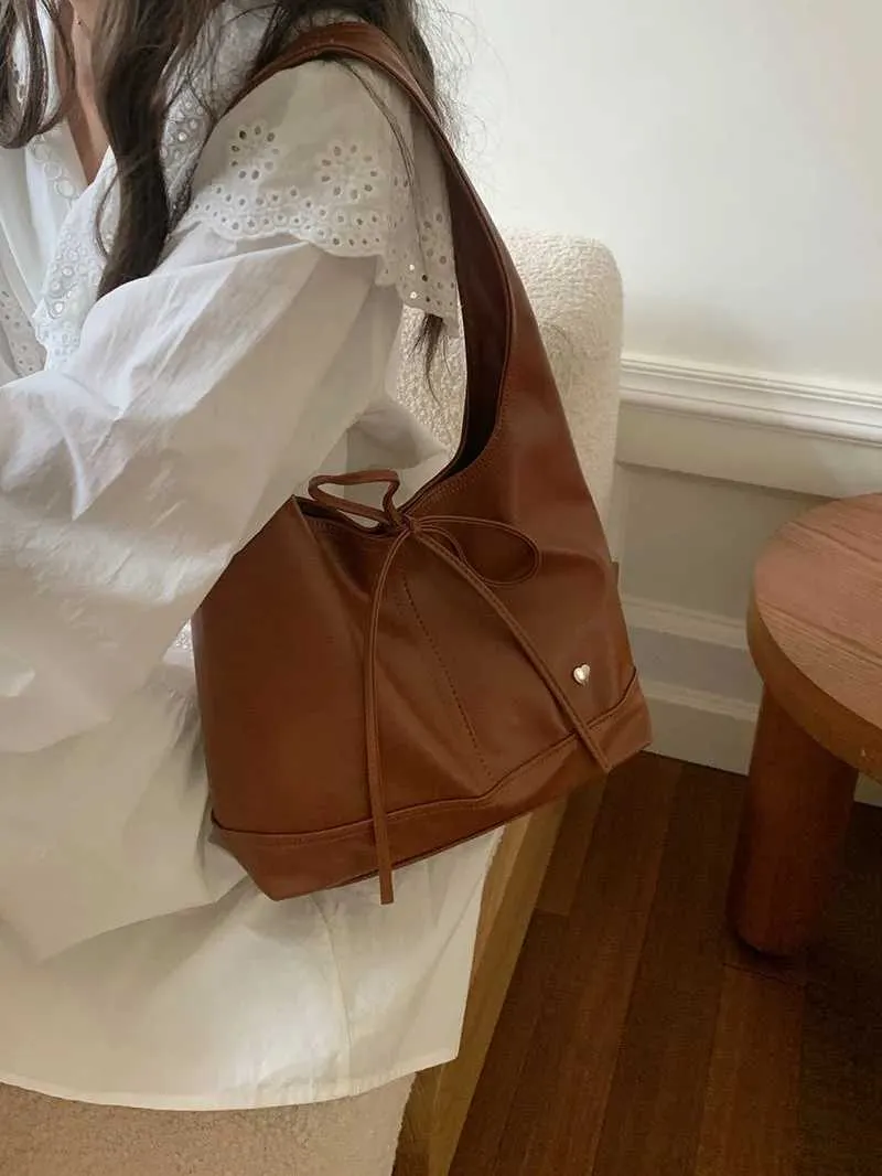 Elegante dames schoudertas en handtas met strik design_voghion.com