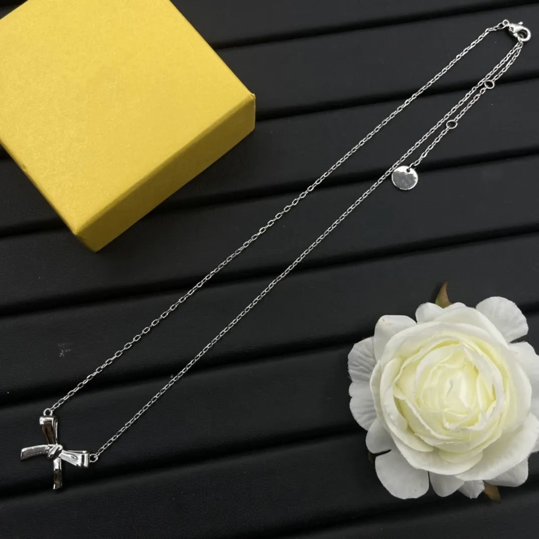 Collana con ciondolo a forma di fiocco in argento dorato con lettera di moda, gioiello da donna, girocollo, regalo per festa di nozze_voghion.com