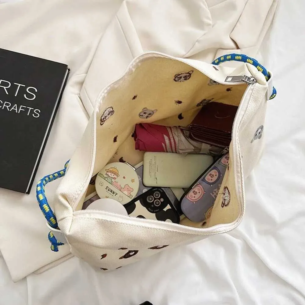 Nouveaux sacs à main de grande capacité pour les courses, sac à bandoulière simple en nylon pour les voyages portables avec dessin animé Ba241214_voghion.com