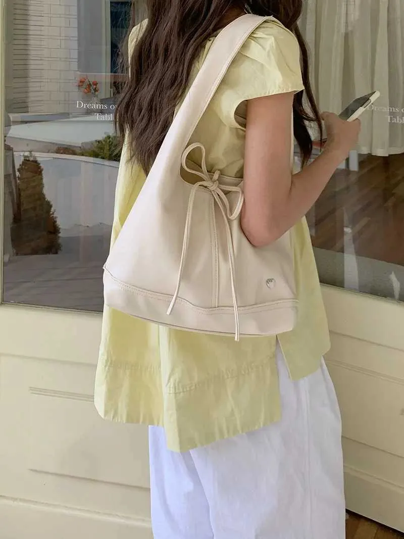 Elegante dames schoudertas en handtas met strik design_voghion.com