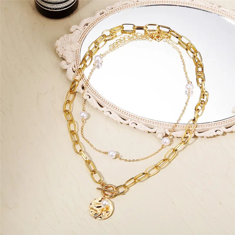 Collana multistrato vintage oro con pendente per donna_voghion.com