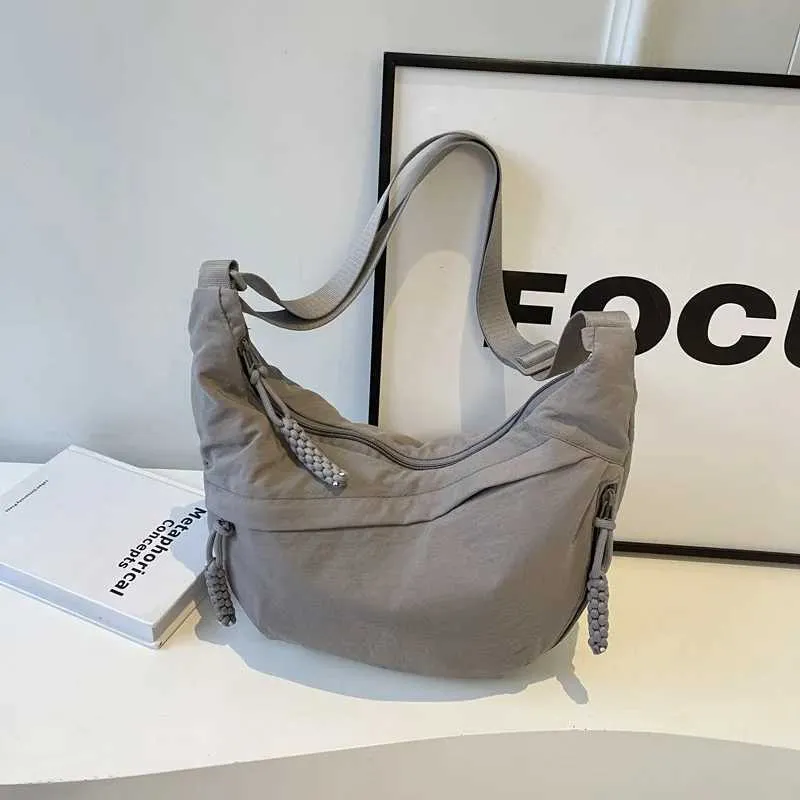 Sac à bandoulière en nylon 2024 pour femme, nouvelle collection été, grande capacité, design polyvalent et de niche, messager Ba241103_voghion.com