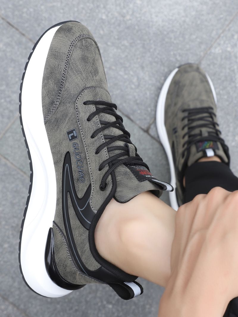 Herfst 2024 nieuwe trend veelzijdige heren sport casual leren oppervlak zwart ademend geurbestendige schoenen heren_voghion.com