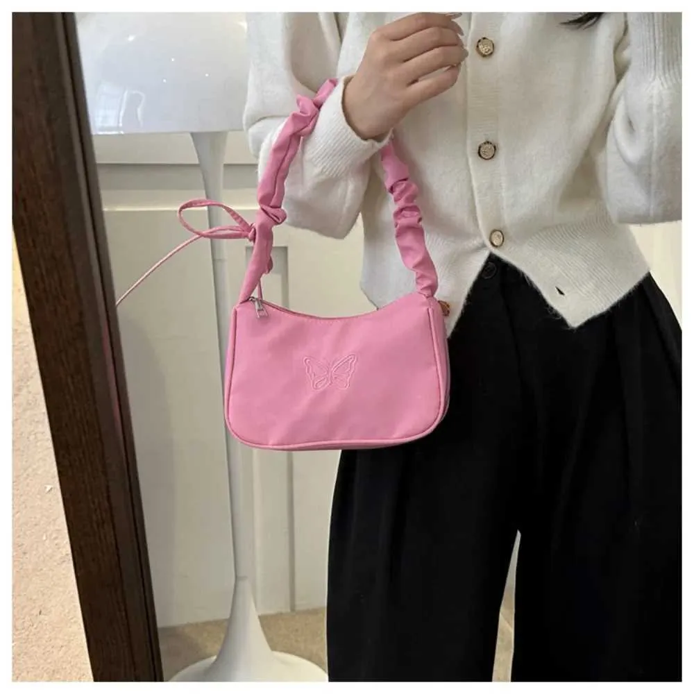 Tikand Bowknot Shoder Bag Y2k stiilis volangidega käepide Nyl Bow meigipulga kott käekott Y241026_voghion.com