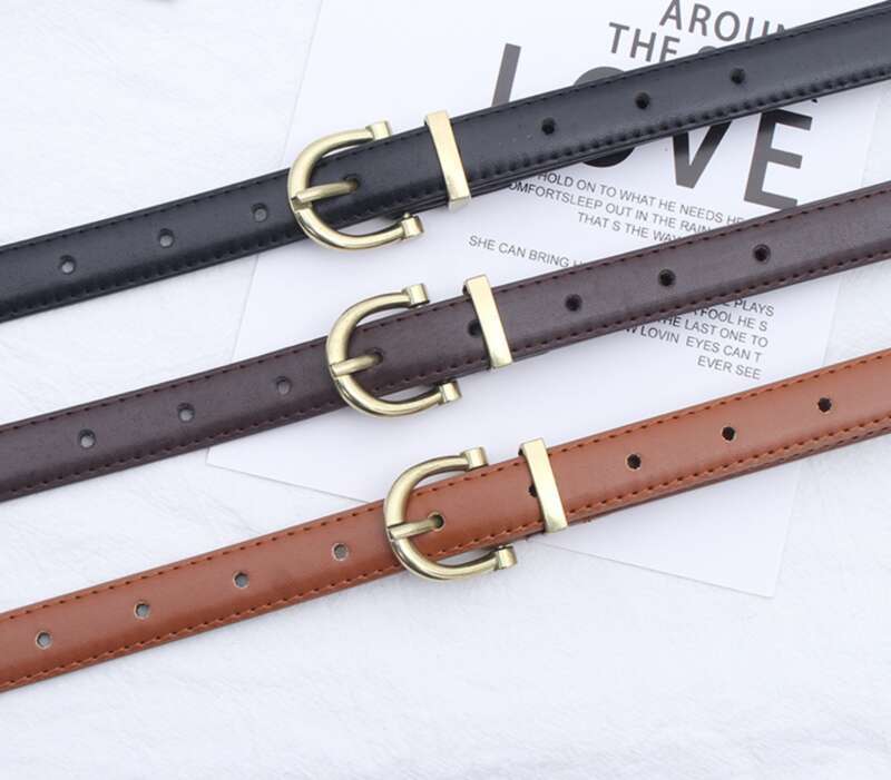 Ceinture spaghetti noire simple avec jean doré_voghion.com