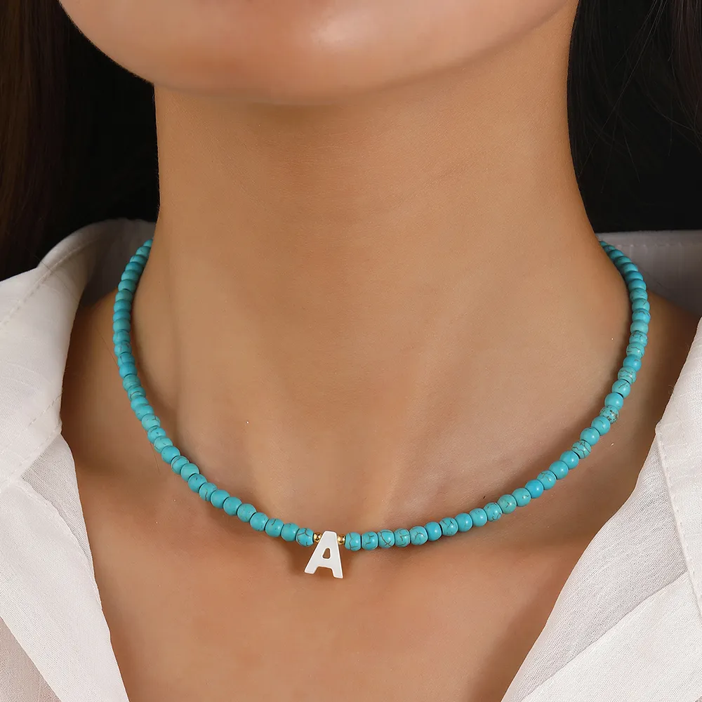 Collane con ciondolo Nome minimalista Iniziale Collana con perline blu da donna con 26 lettere dell'alfabeto Moda Compleanno Coppia_voghion.com