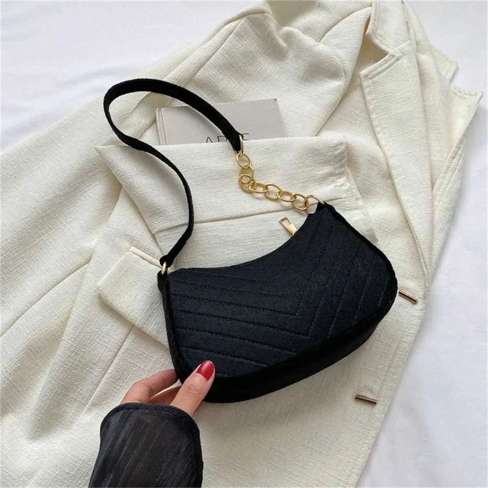 Designer Bag New womens retro gerie solid color shoulder casual wallet garbage simple and fashionable cross shaped bag_voghion.com
