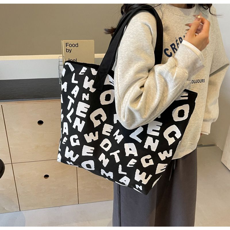 Persönlichkeit bedruckter Buchstabe Mommy Bag 2024 neue Textur Farbkontrast Freizeit Canvas große Kapazität Tote_voghion.com