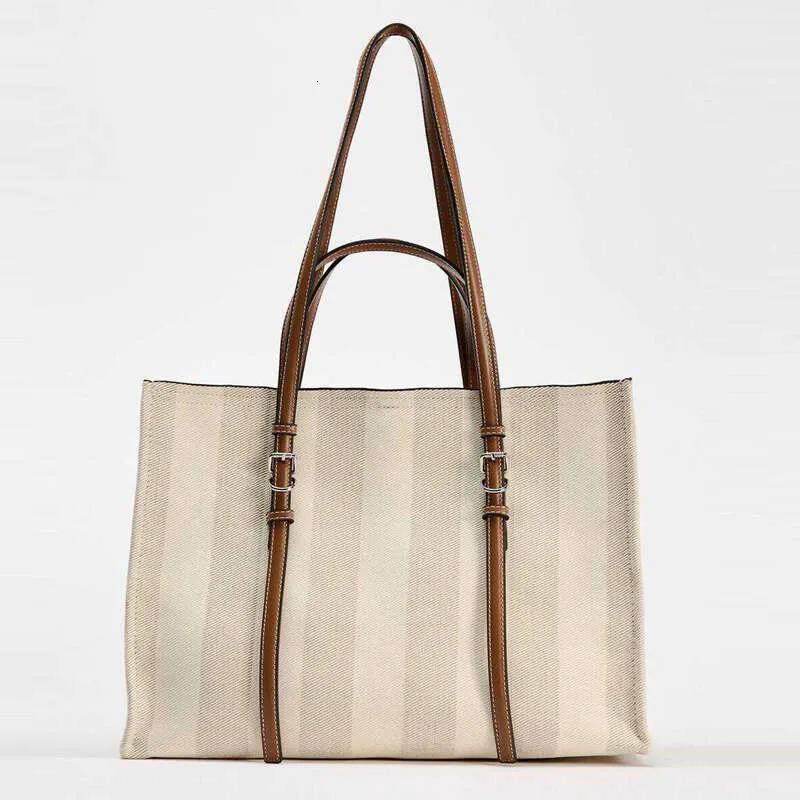 Tragetaschen mit Streifendruck für Damen, Designer-Handtaschen, Geldbörsen 2024, neu aus lässigem Canvas, große Kapazität, Pendler-Schulter_voghion.com
