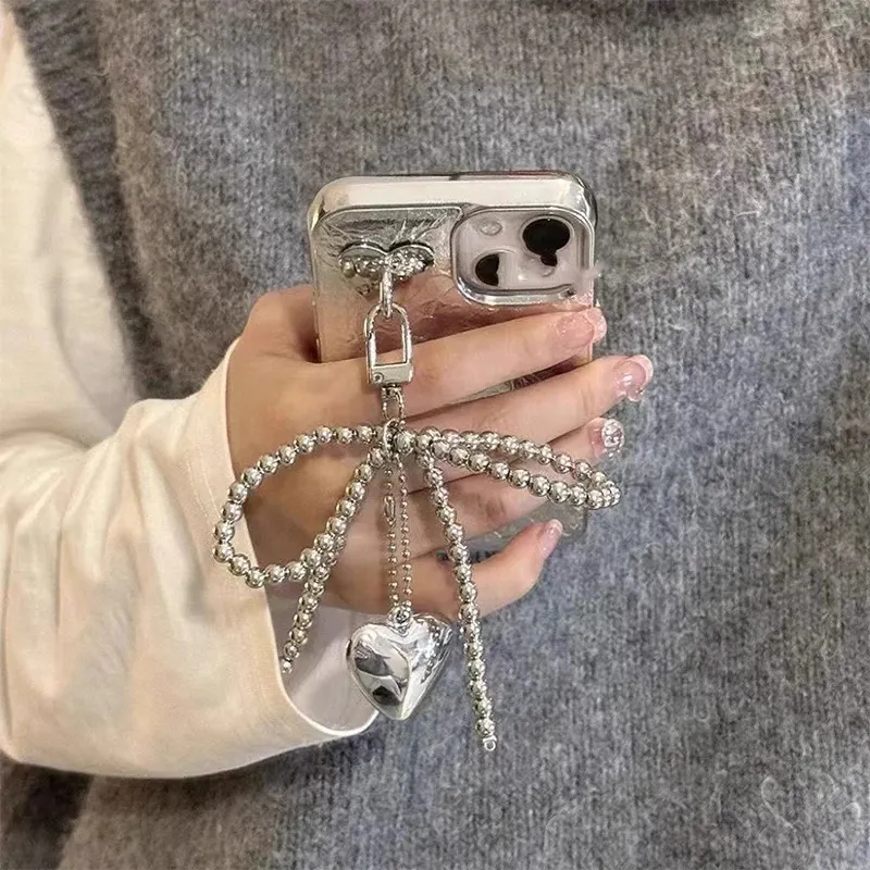Ins Style Bowknot Perlenkette Dreidimensionale Sier Herz Telefon Anhänger Kopfhörer Fall Charm Tasche Dekor Auto Schlüsselanhänger_voghion.com