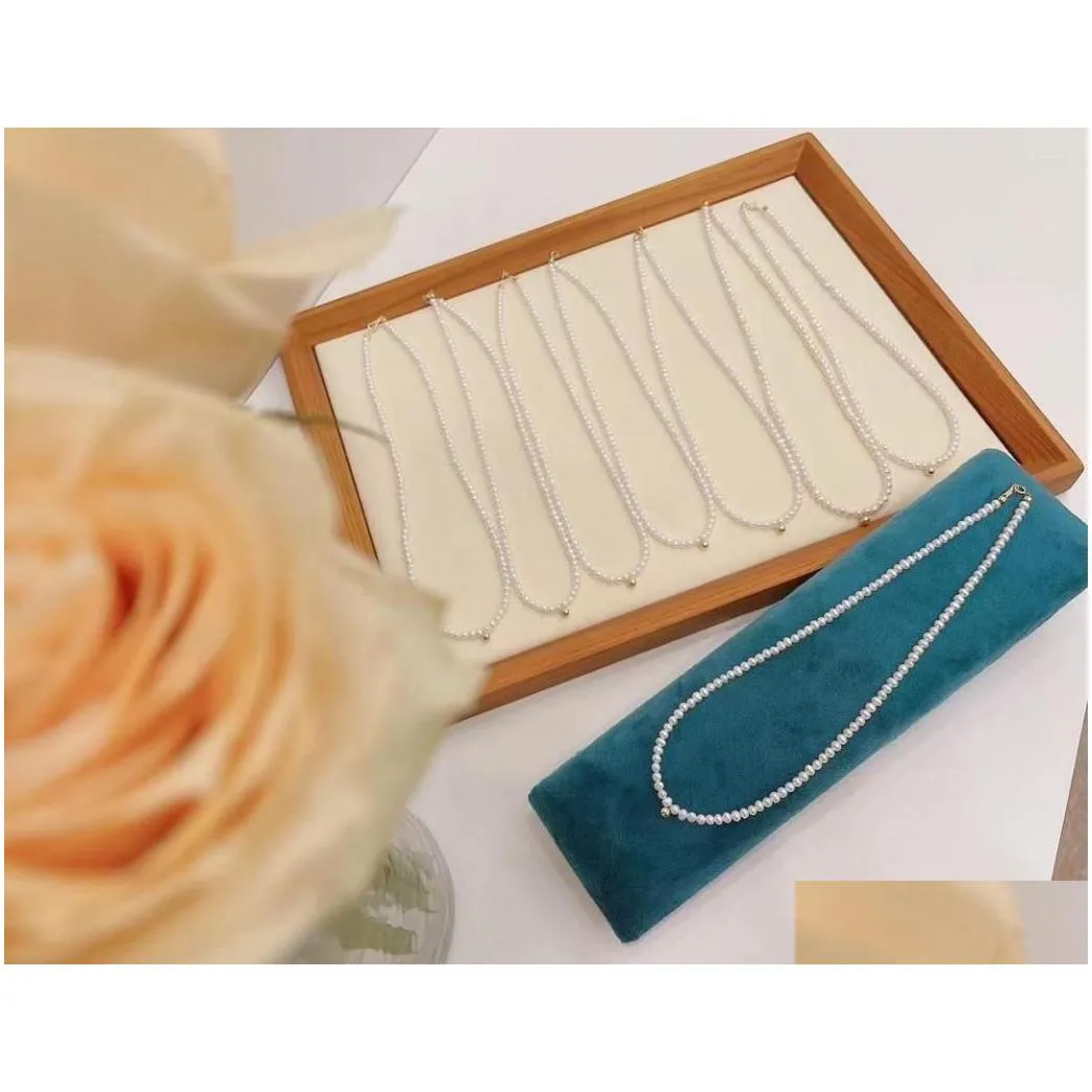 Elegante natuurlijke zoetwaterparelketting met ovale parels_voghion.com
