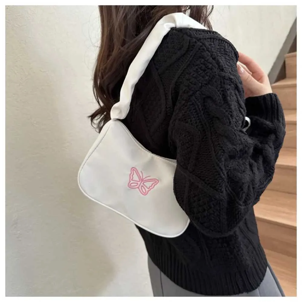 Tikand Bowknot Shoder Bag Y2k stiilis volangidega käepide Nyl Bow meigipulga kott käekott Y241026_voghion.com