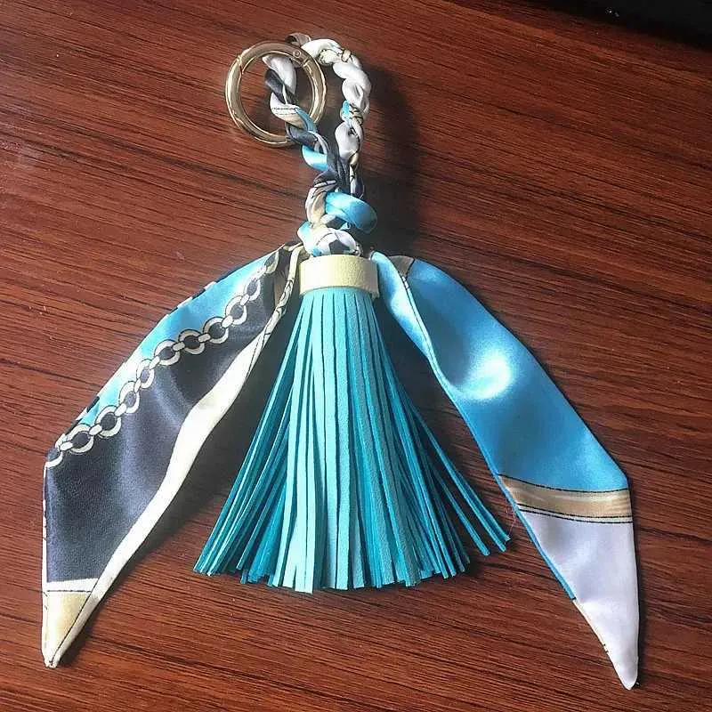 Pingente de lenço com borla de couro macio e fofo, acessório para bolsa, novo chaveiro, porta-chaves de carro da moda K1690 Y241121_voghion.com