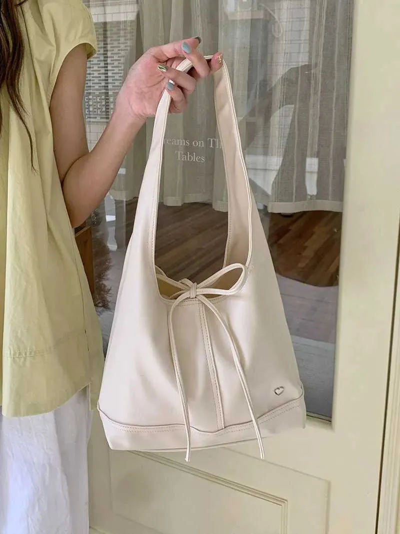 Elegante dames schoudertas en handtas met strik design_voghion.com