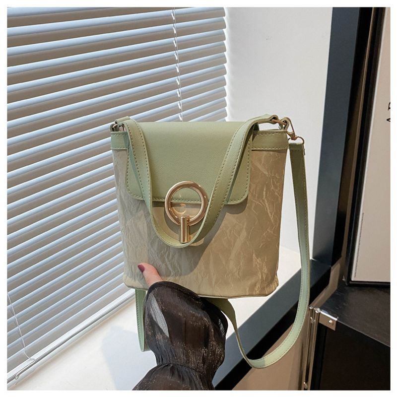 Handheld frauen mit stiolle spleißen kontrast farbe eimer urlaub 2024 frühjahr/sommer neue umhängetasche, trendy_voghion.com