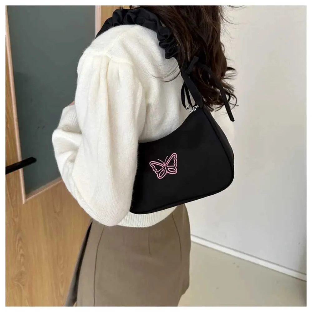 Tikand Bowknot Shoder Bag Y2k stiilis volangidega käepide Nyl Bow meigipulga kott käekott Y241026_voghion.com