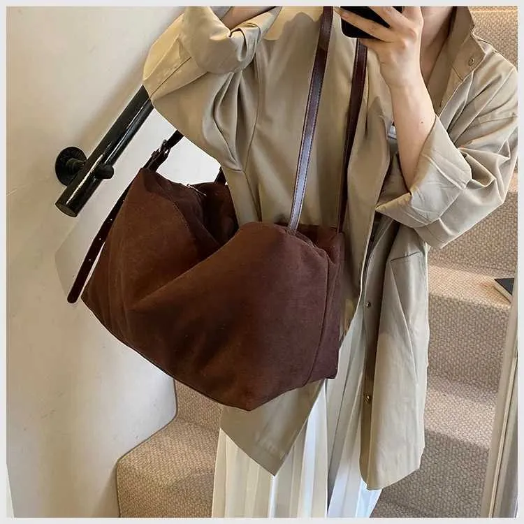 Camurça para mulheres bolsas sólidas grande capacidade crossbody bolsas femininas casuais bolsa de ombro macia pacotes de armazenamento de viagem C241212_voghion.com