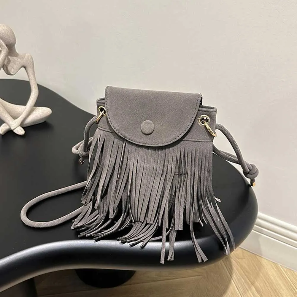 Borsa a tracolla con tracolla regolabile e design a frange, borsa a tracolla alla moda, versatile per le donne per l'autunno e_voghion.com