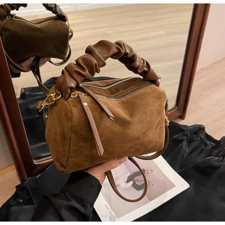 Modieuze schoudertas en crossbody tas met plooi voor dames_voghion.com