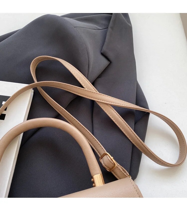 Demellier Diseño de nicho de moda, pequeño cuadrado portátil para mujeres en 2024, bolso de hombro único de nueva textura, moderno y_voghion.com