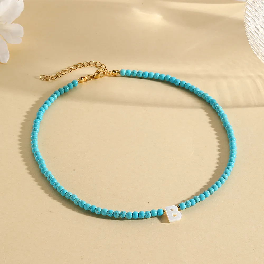 Collane con ciondolo Nome minimalista Iniziale Collana con perline blu da donna con 26 lettere dell'alfabeto Moda Compleanno Coppia_voghion.com