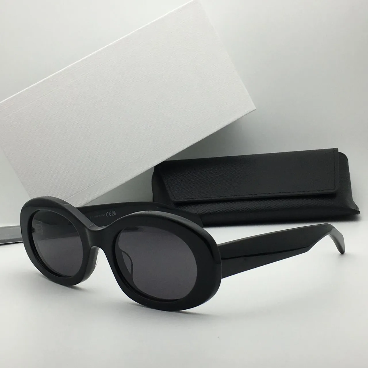 Óculos de sol de designer para homem e mulher retro oval_voghion.com