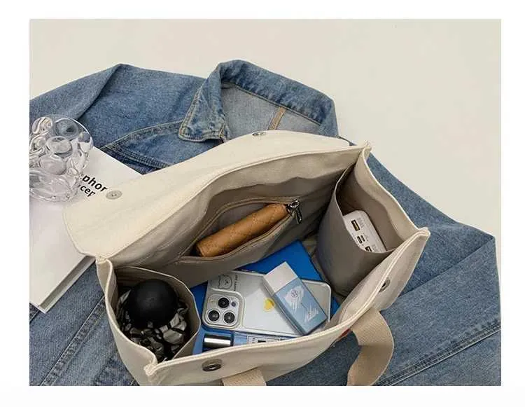Stor axelremsväska i canvas och crossbody för damer_voghion.com
