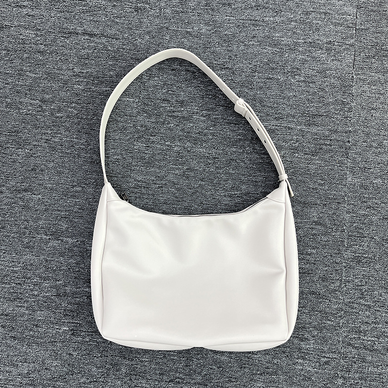 Corea del Sur Color sólido 2024 nuevo bolso de viaje para el aula de un hombro de gran capacidad de cara suave, bolso cruzado único_voghion.com