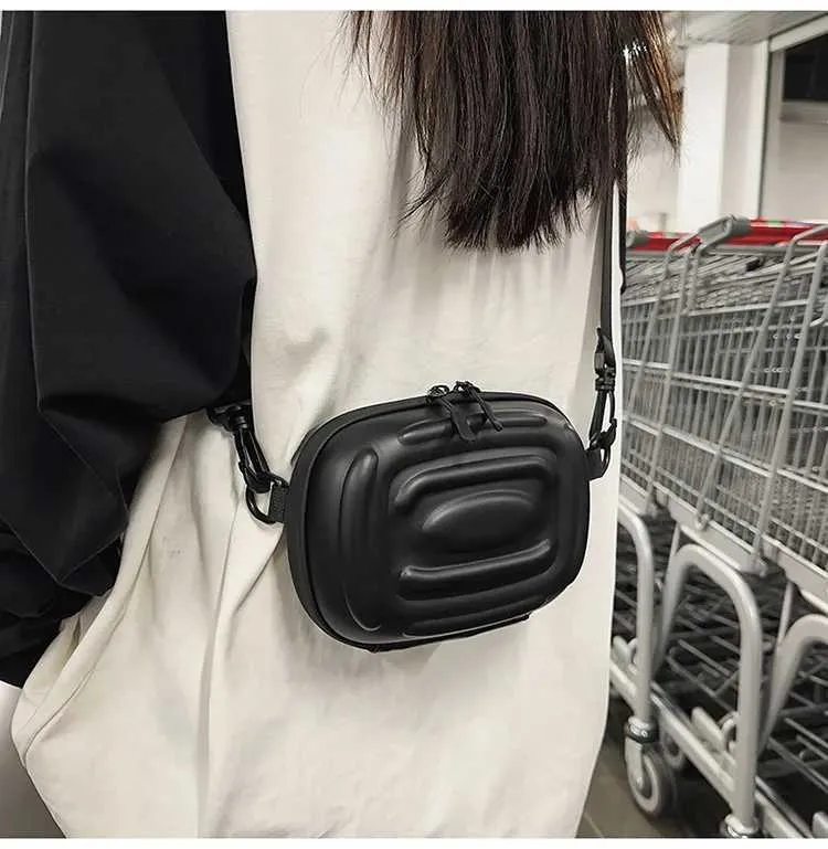 Sac à bandoulière simple polyvalent pour hommes et femmes, nouvelle marque tendance de niche, sac à bandoulière à coque rigide à la mode, petit carré_voghion.com